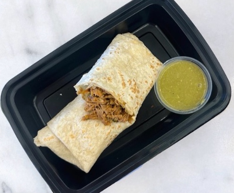 Beef Machaca Burrito with a side of salsa verde